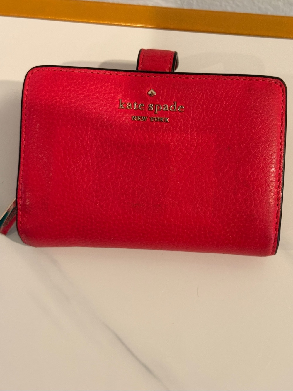 kate spade red pebbled leather snap wallet with gold logo‎